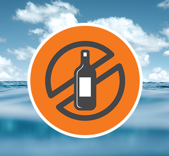 a man wearing a lifejacket holds a water bottle in his right hand and signals the number four with his left hand